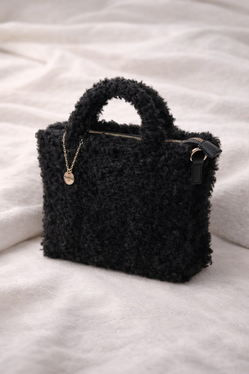 Black furry bag