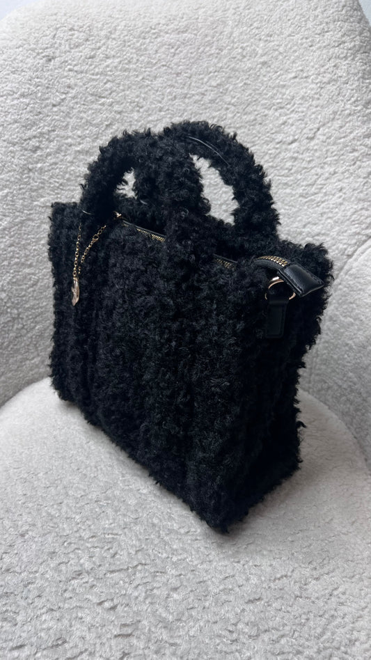 Black furry bag