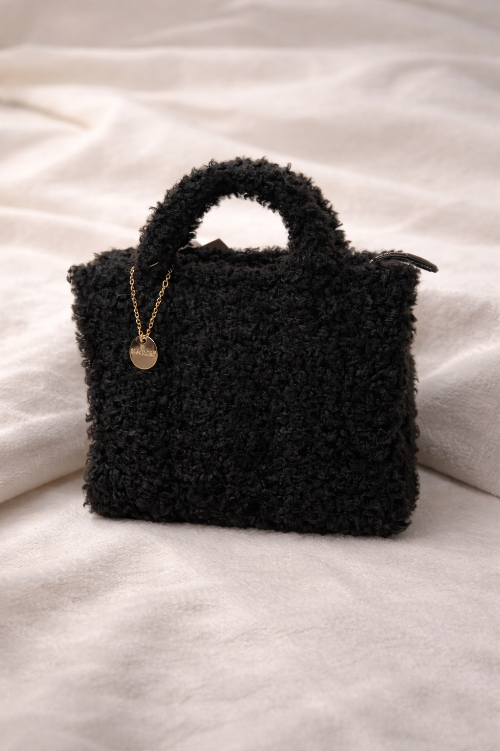 Black furry bag
